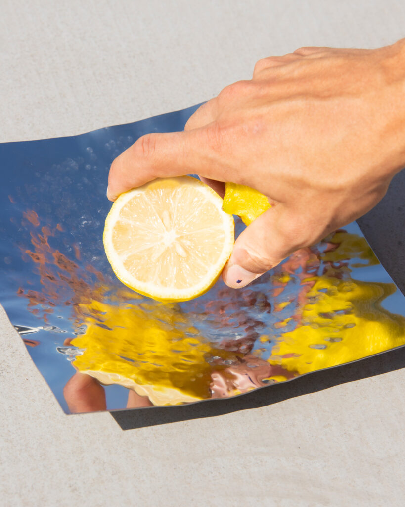 "Designer Stainless Steel Bowl – the Balance Bowl in use, showcasing its dynamic design and functionality during an olive oil tasting experience."